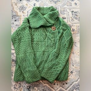 Size medium green wool Aran Isles sweater made in Ireland.
